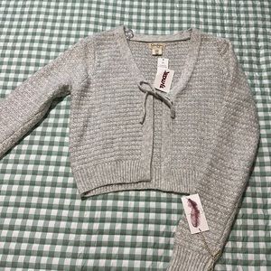 never worn, tie front sweater